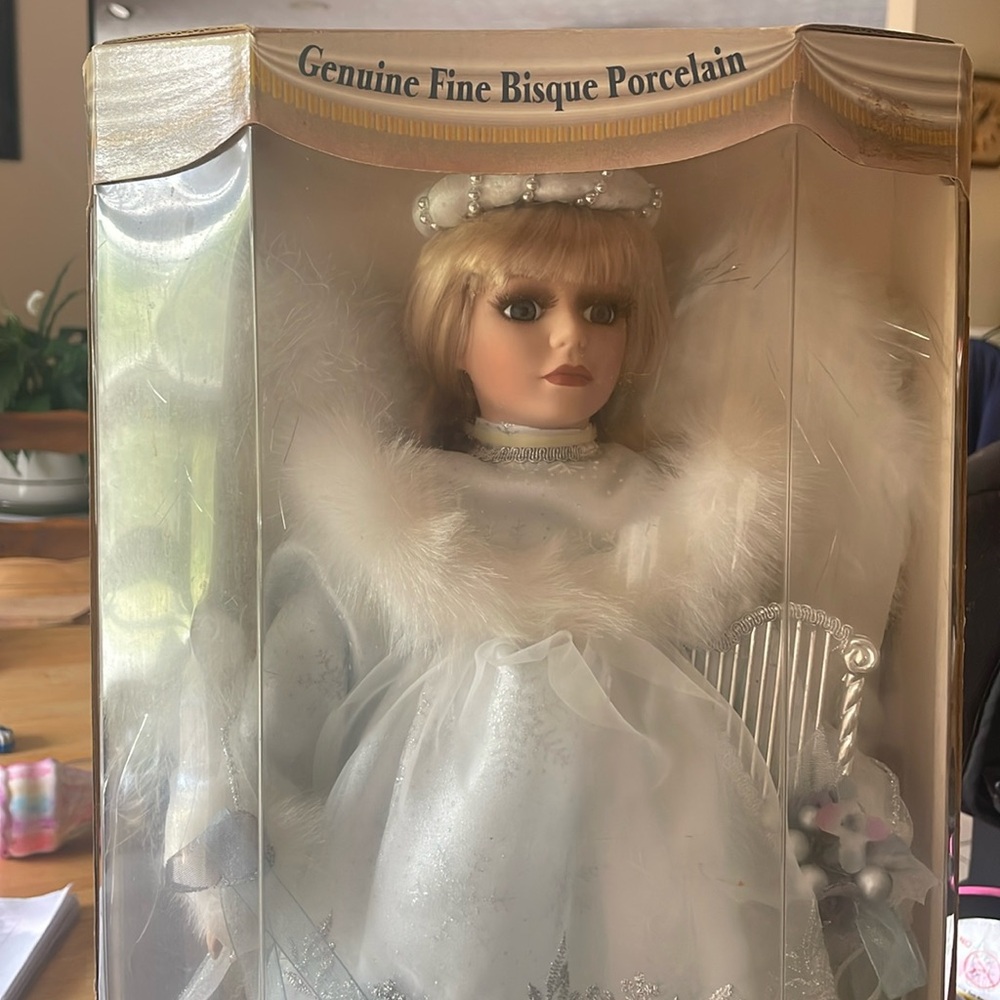New bisque porcelain doll